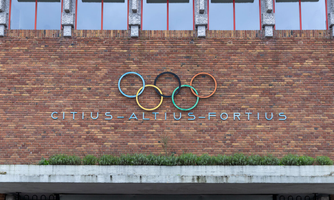 Olympic Stadium Amsterdam. Olympic rings on red brown bricks on the Olympic Stadium above the entrance.