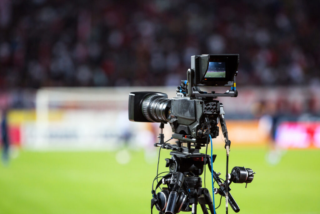 TV camera broadcasting during a football (soccer) match