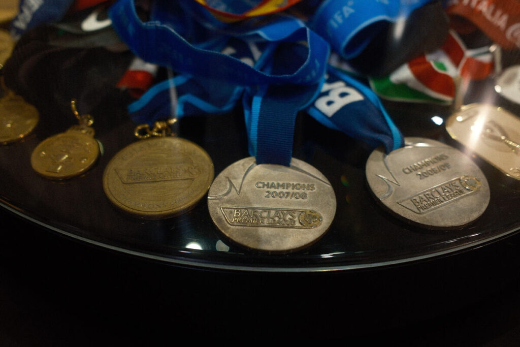 Set of Premier League winner medals in a museum