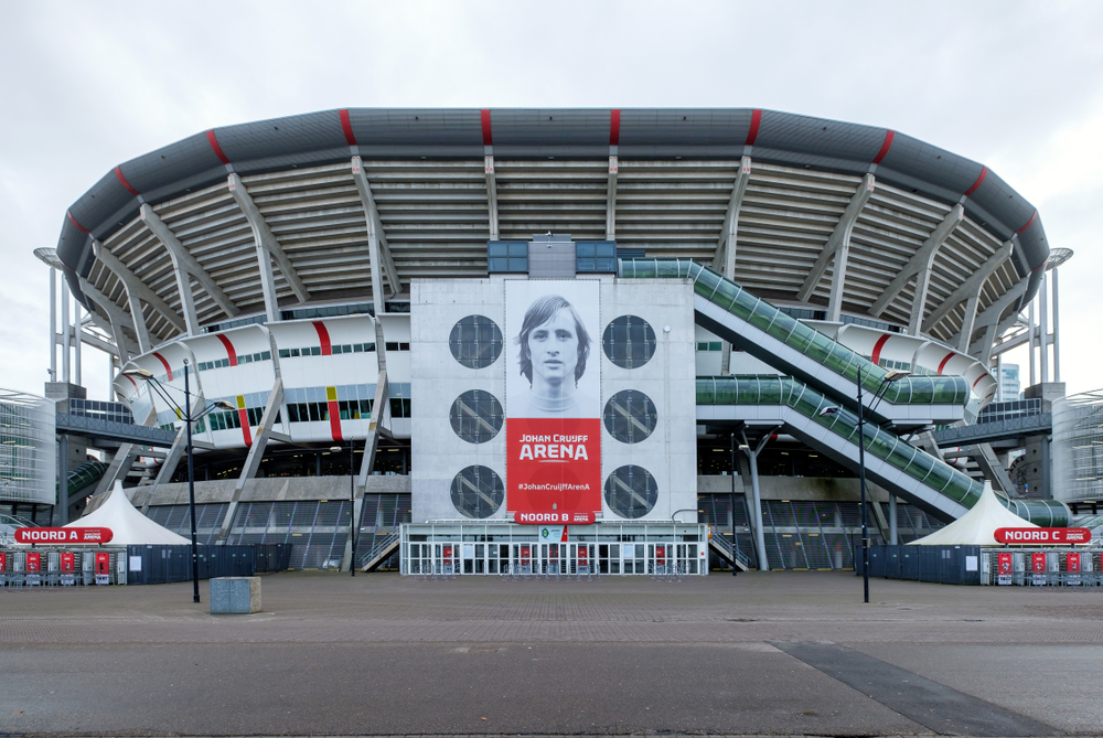 Outside view of the Johan Cruijff Arena soccer stadium, home of the Ajax team, with a big portrait of Cruijff over the entrance 