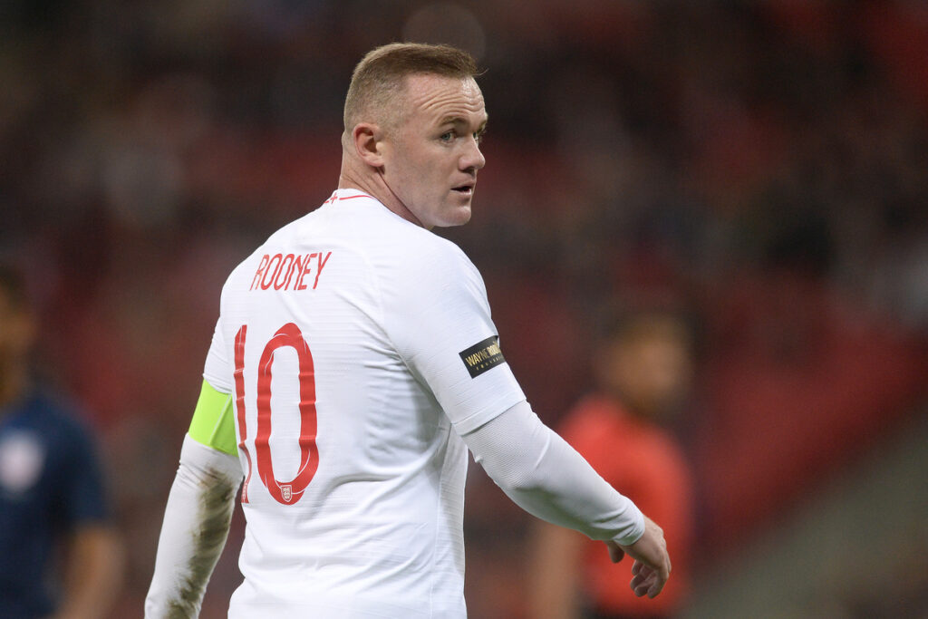 Wayne Rooney looking over his shoulder during football match