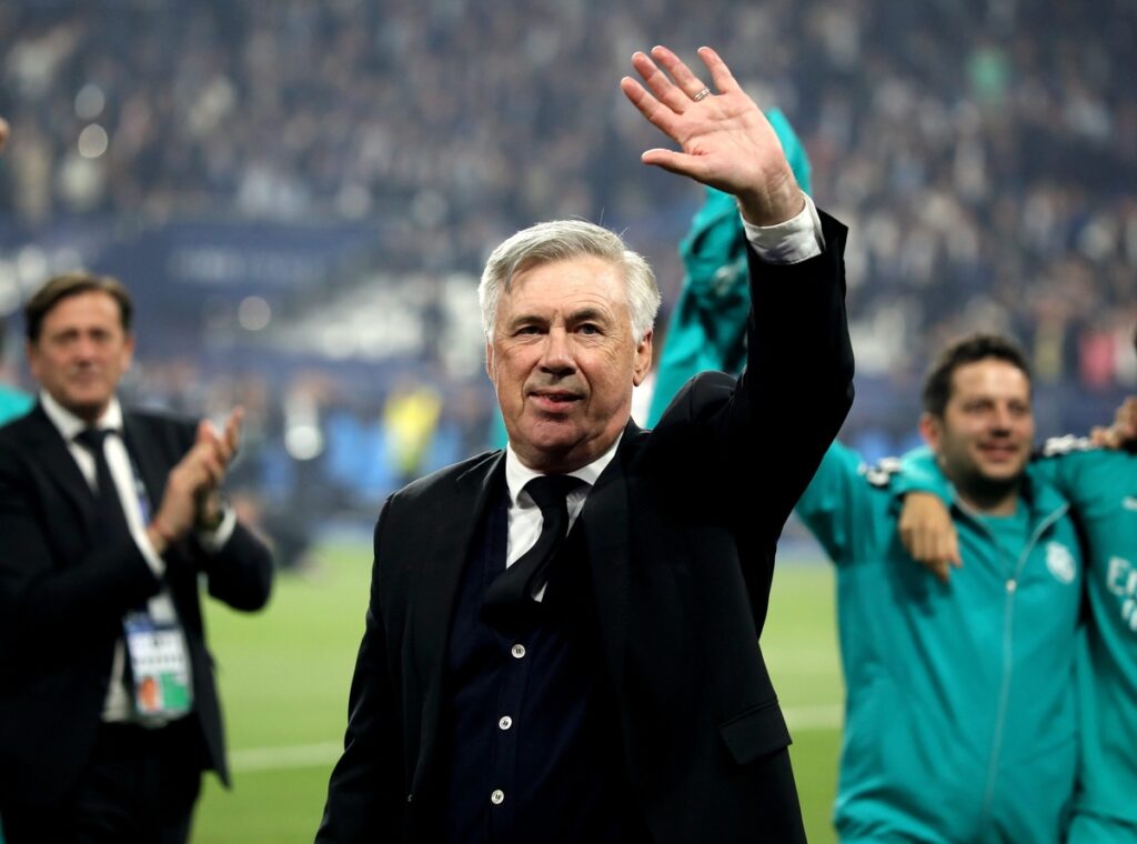 Carlo Ancelotti of Real Madrid waving his hand to fans