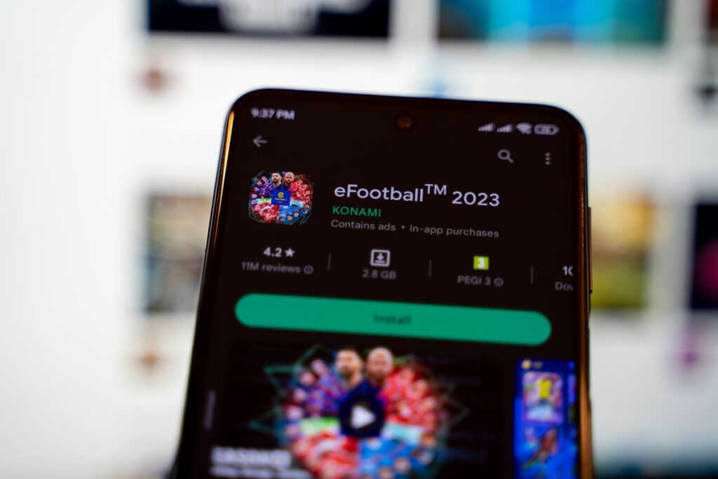 phone screen with eFootball 2023 on Google Play