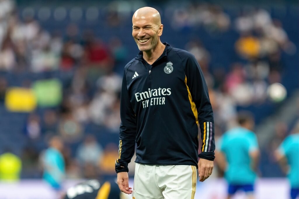 Former Real Madrid player Zinedine Zidane on the stadium, smiling