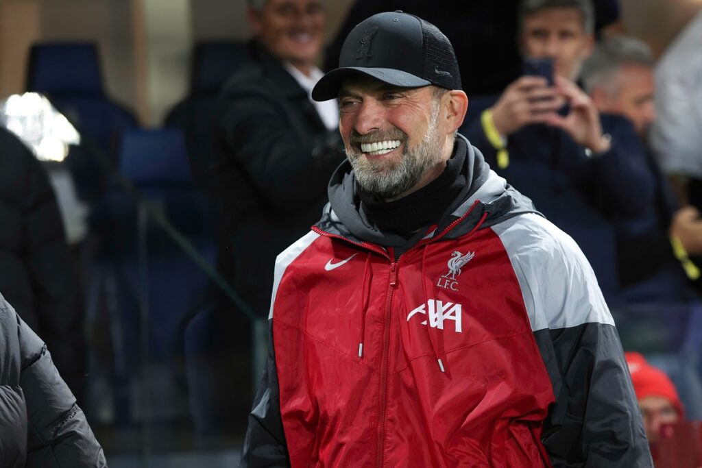 Jurgen Klopp smiling from the benches