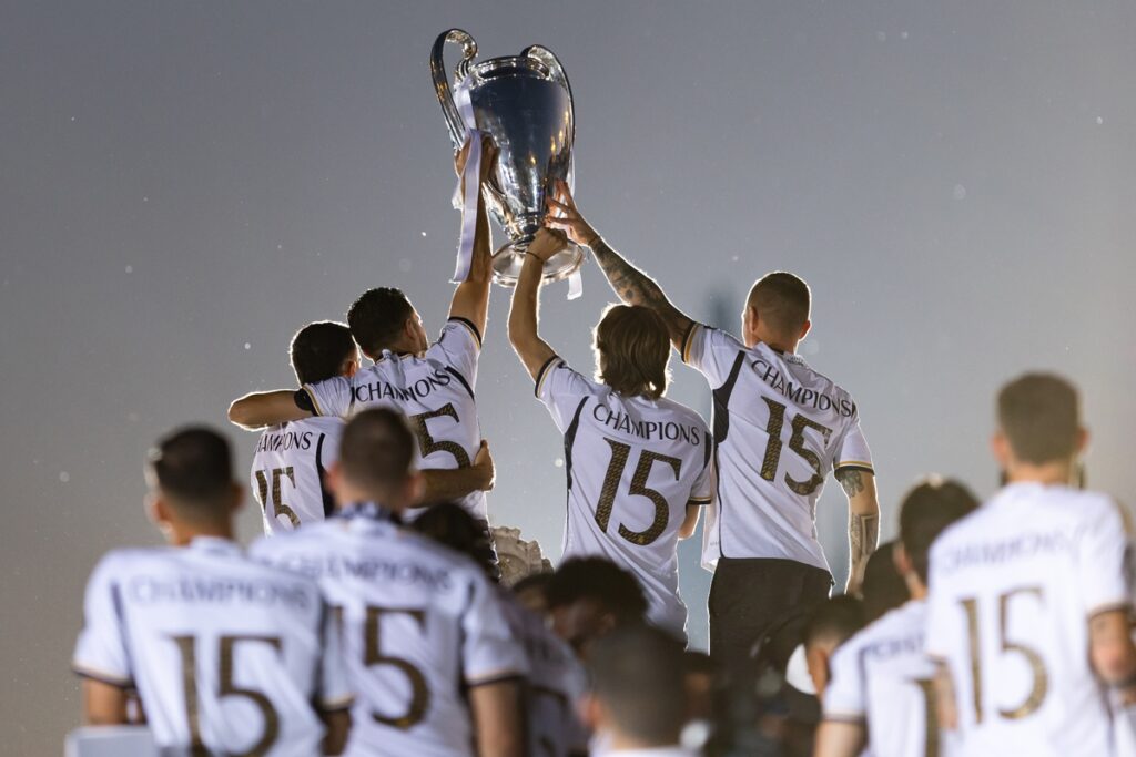 Football team Real celebrating victory Champions League Cup