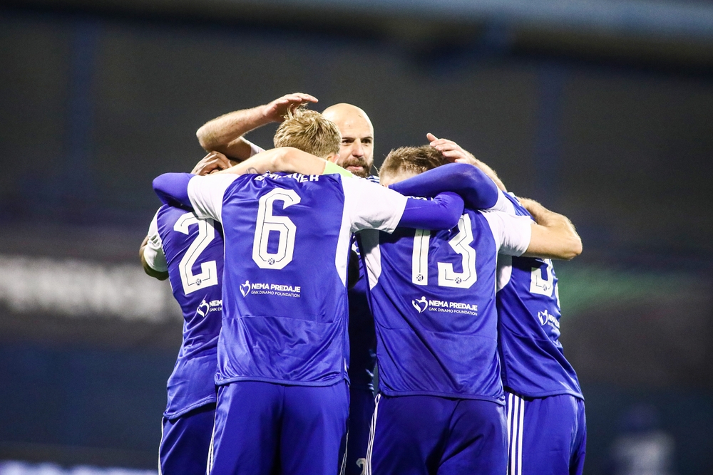 Dinamo Zagreb's players celebrate after the end of a Conference League Knock Out game between Dinamo Zagreb and PAOK FC. 
