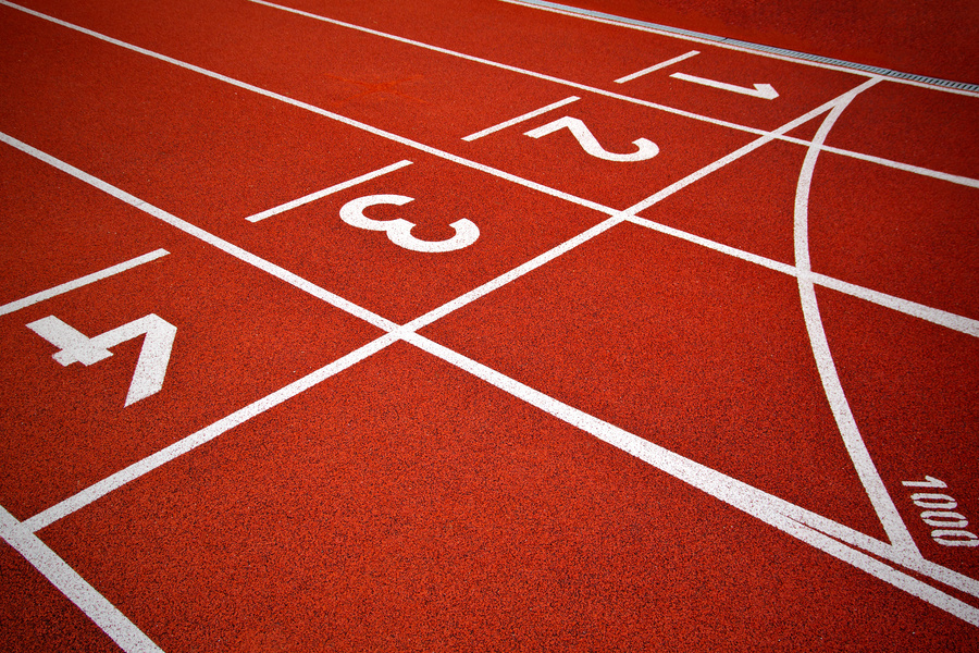 Athletics Start track lanes 1 2 3 of a red running racing track