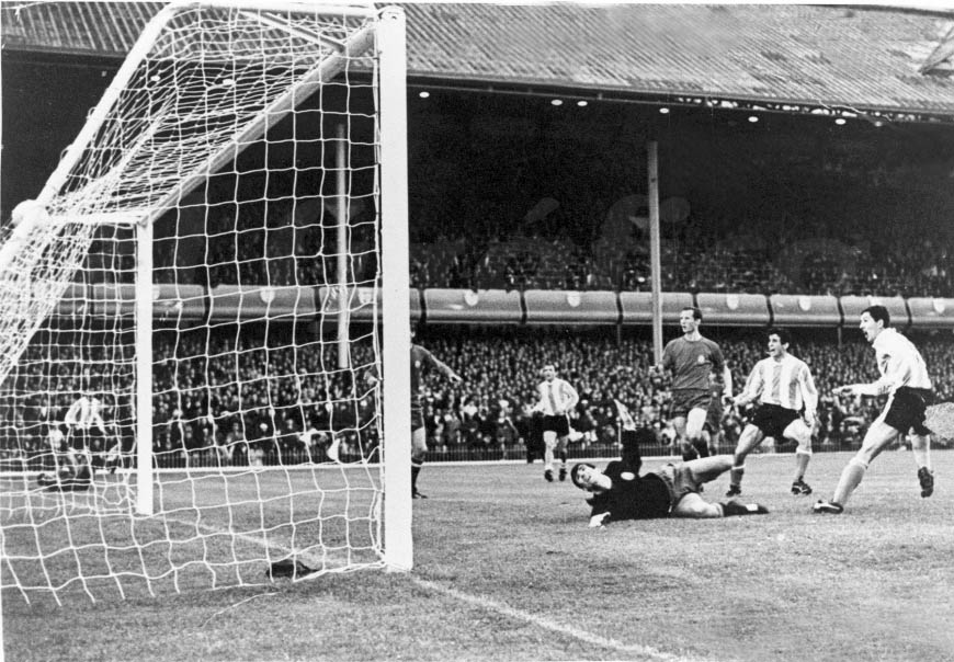 Argentine forward Luis Artime scoring his first goal (of 2) v. Spain at the 1966 FIFA World Cup.