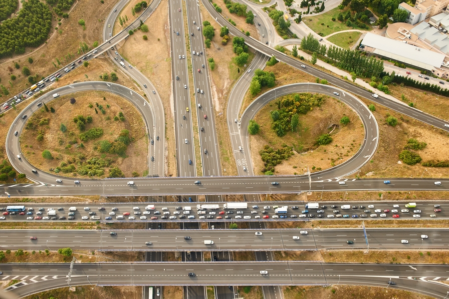 Aerial view of a highway with traffic in Madrid.
