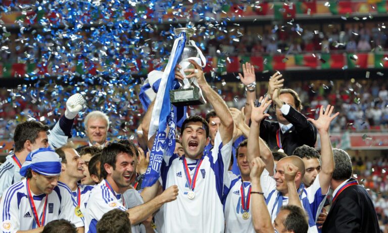 Greece national team raising the Euro 2004 trophy