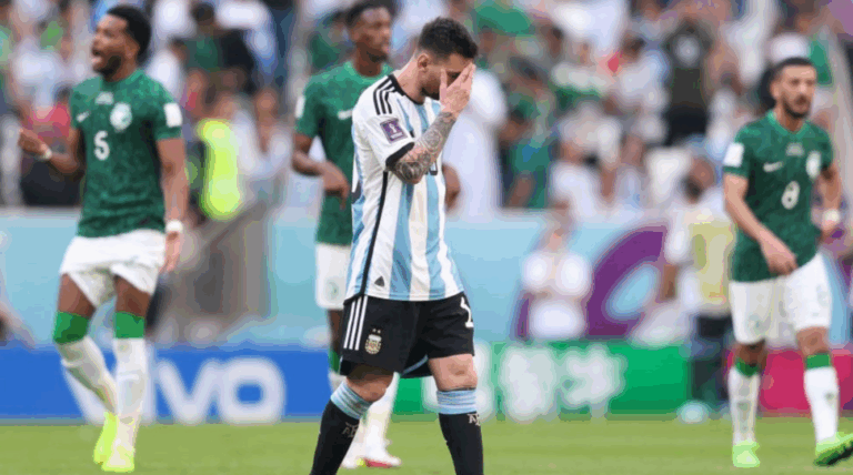 Messi covering his face after losing a game
