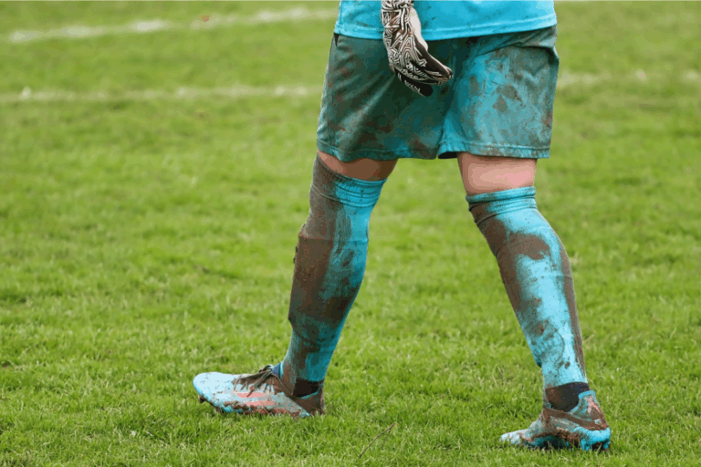 goalkeeper walking on the football field