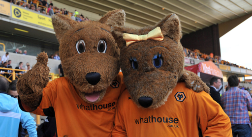wolfie and wendy wolf during a football match