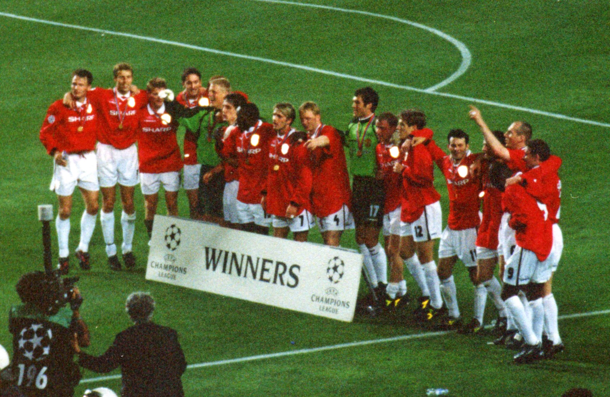 Manchester United after winning the Champions League in 1999
