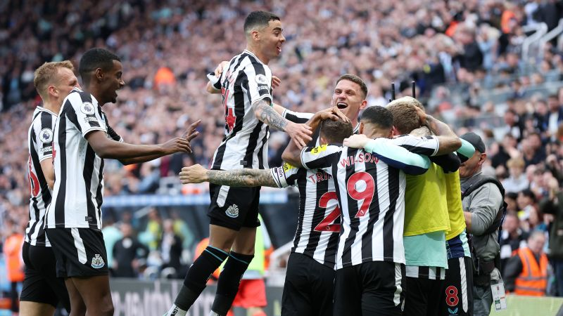 team celebrating a goal scored