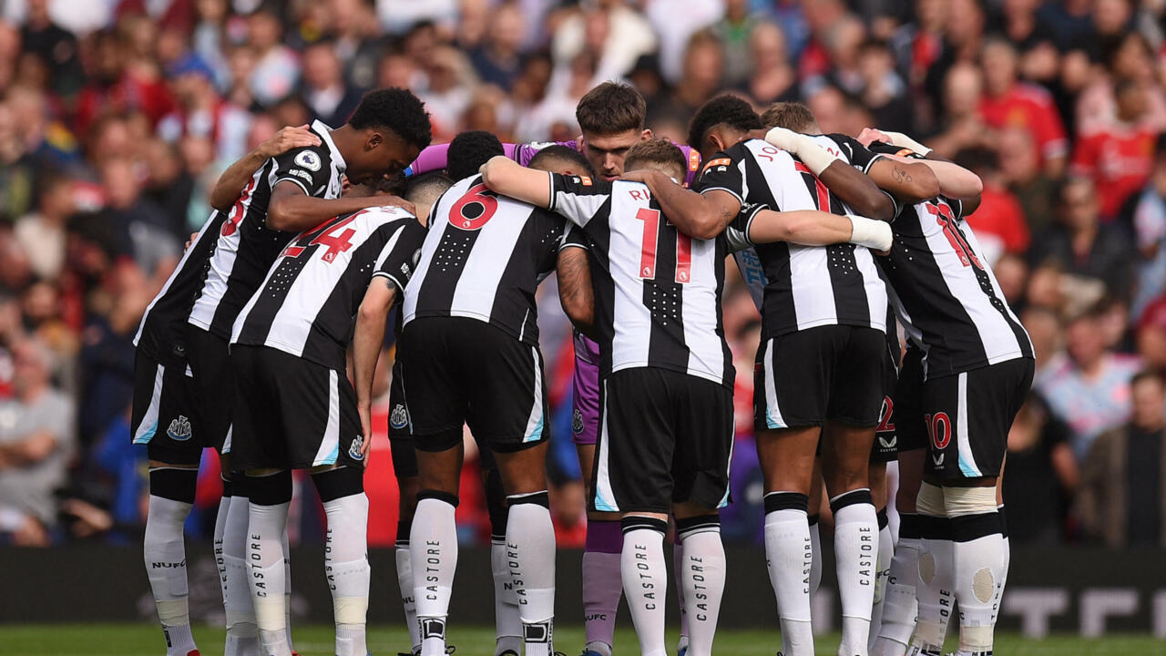 team discussing tactics during a game
