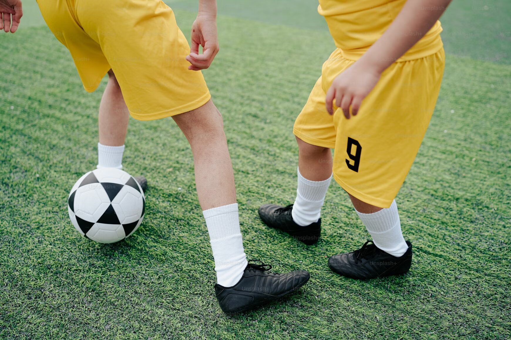 kids training in the football pitch