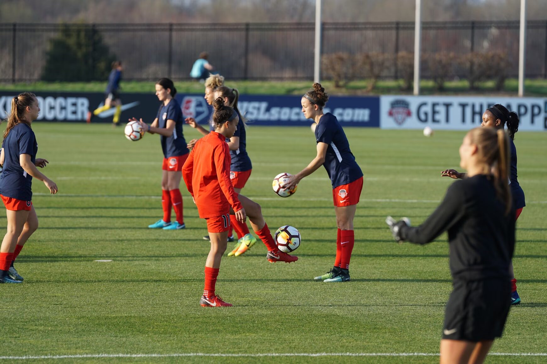 people training football on the field