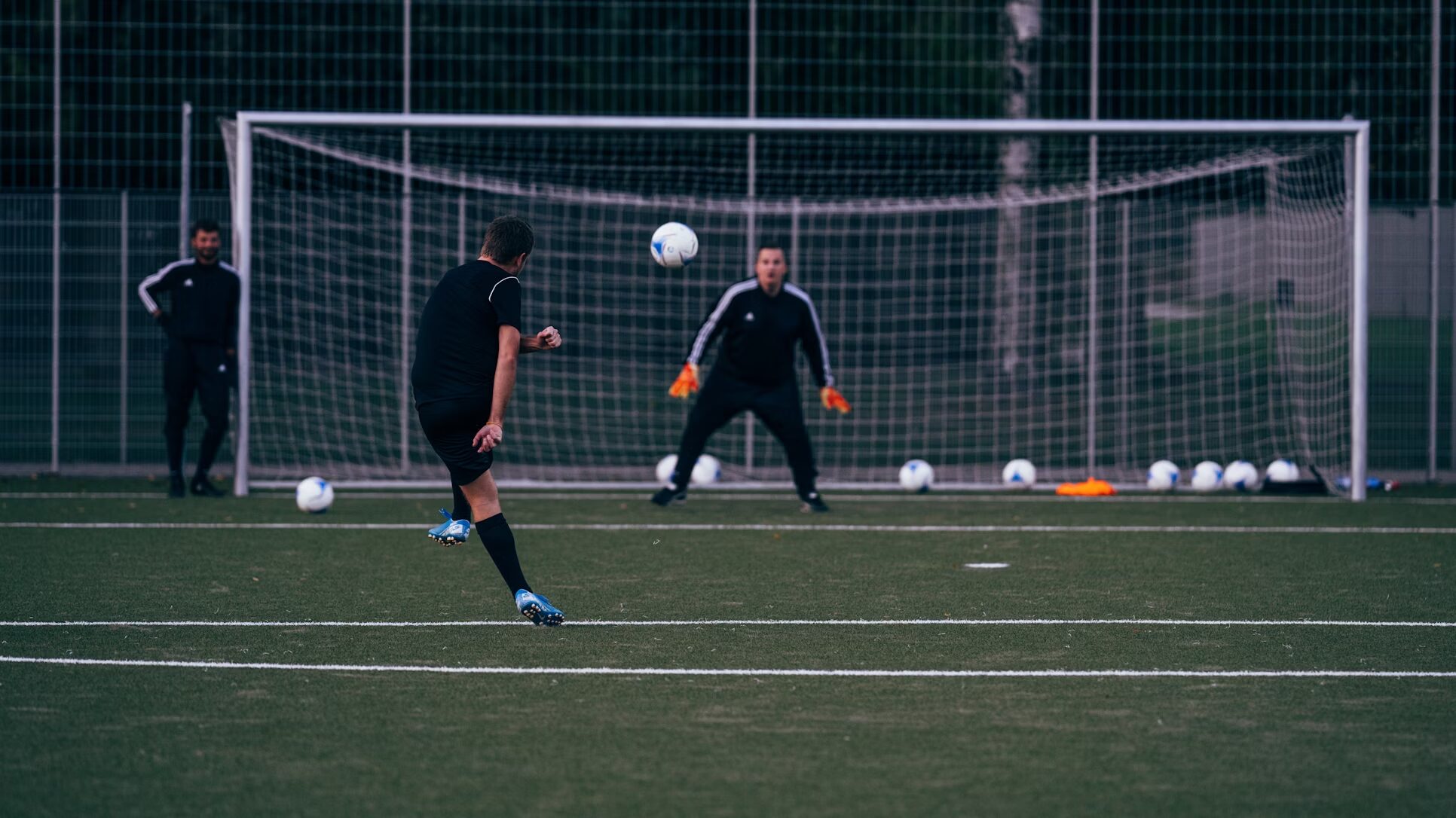player kicking the ball during training