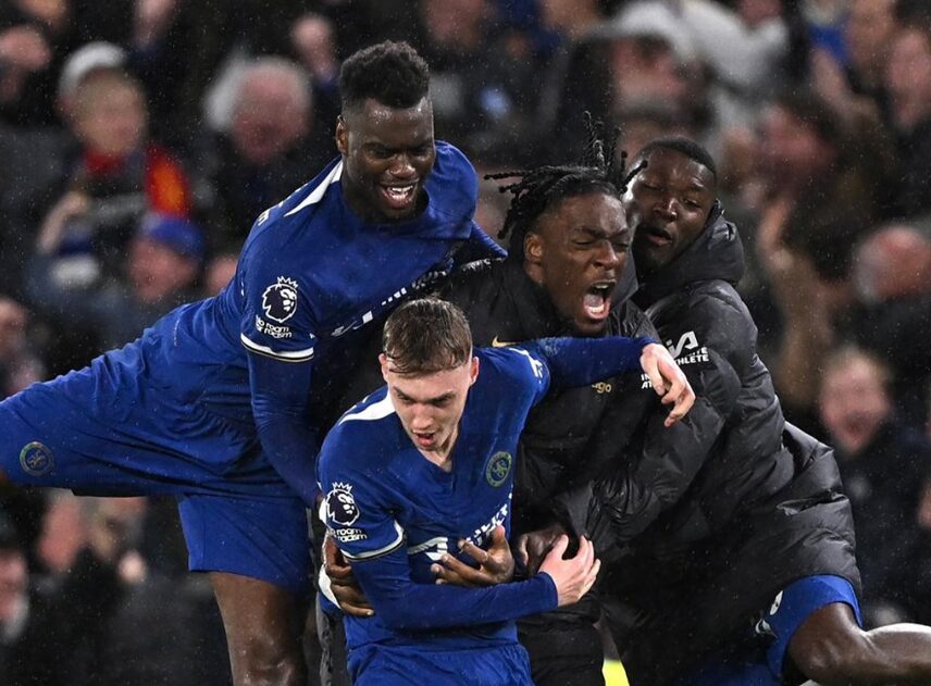 team celebrating a goal during a game