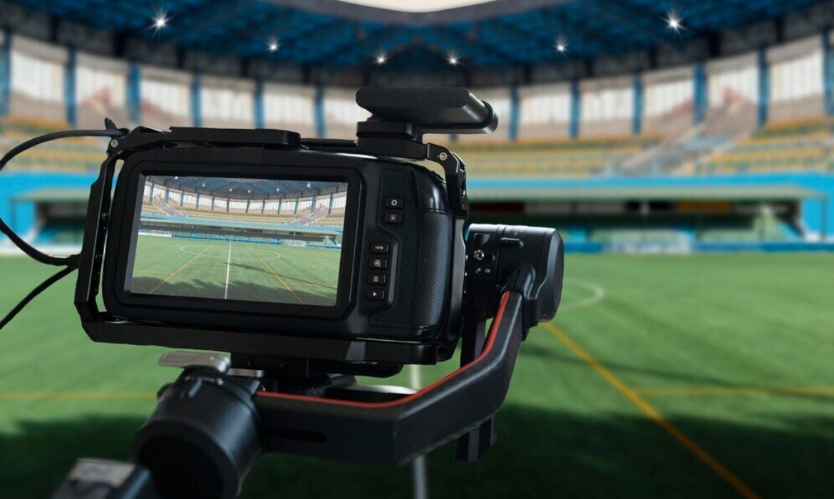 camera recording a football game