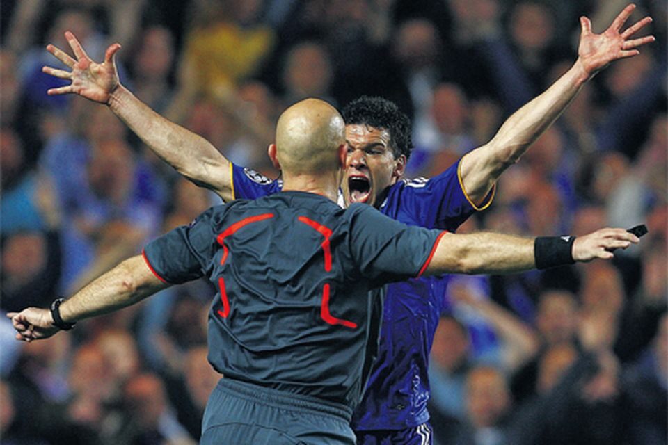 Chelsea player yelling at the referee