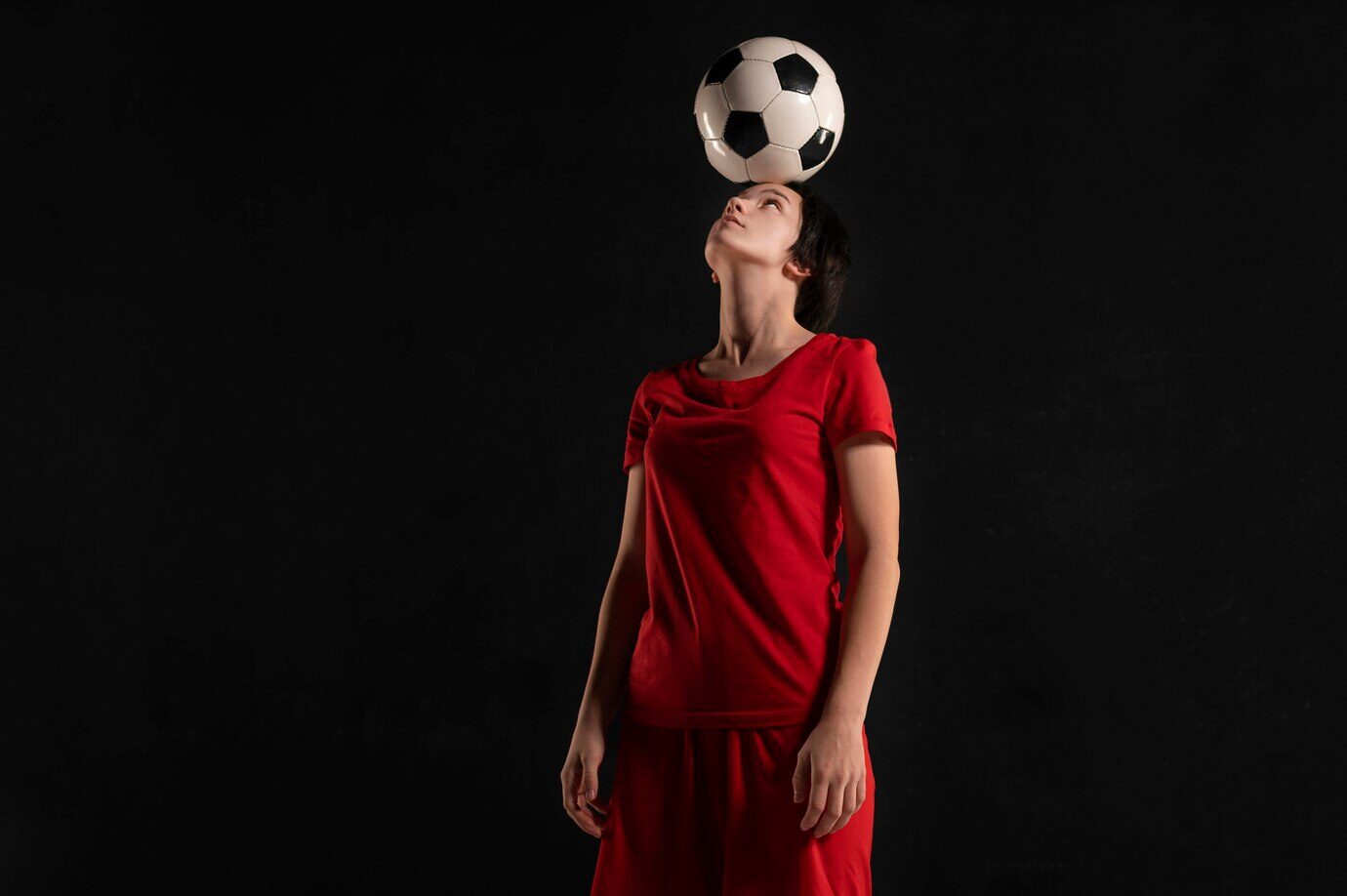 female player with a football