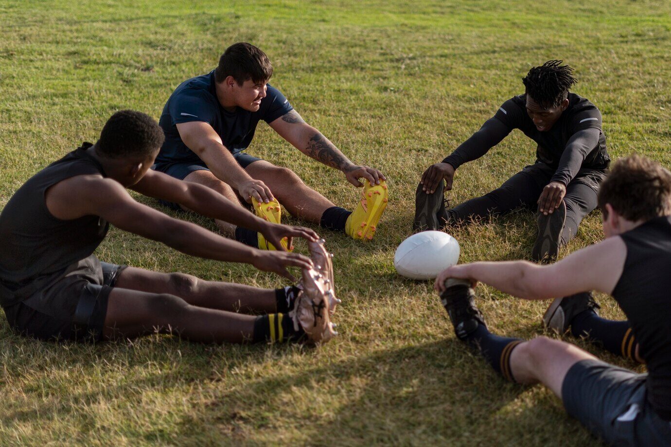 football players warming up