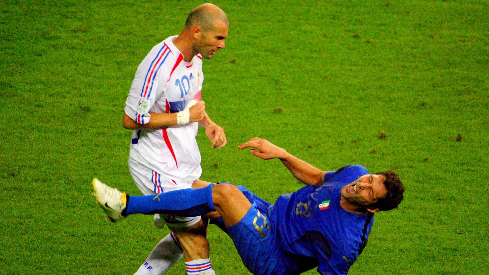 Materazzi falling after being headbutted by Zidane