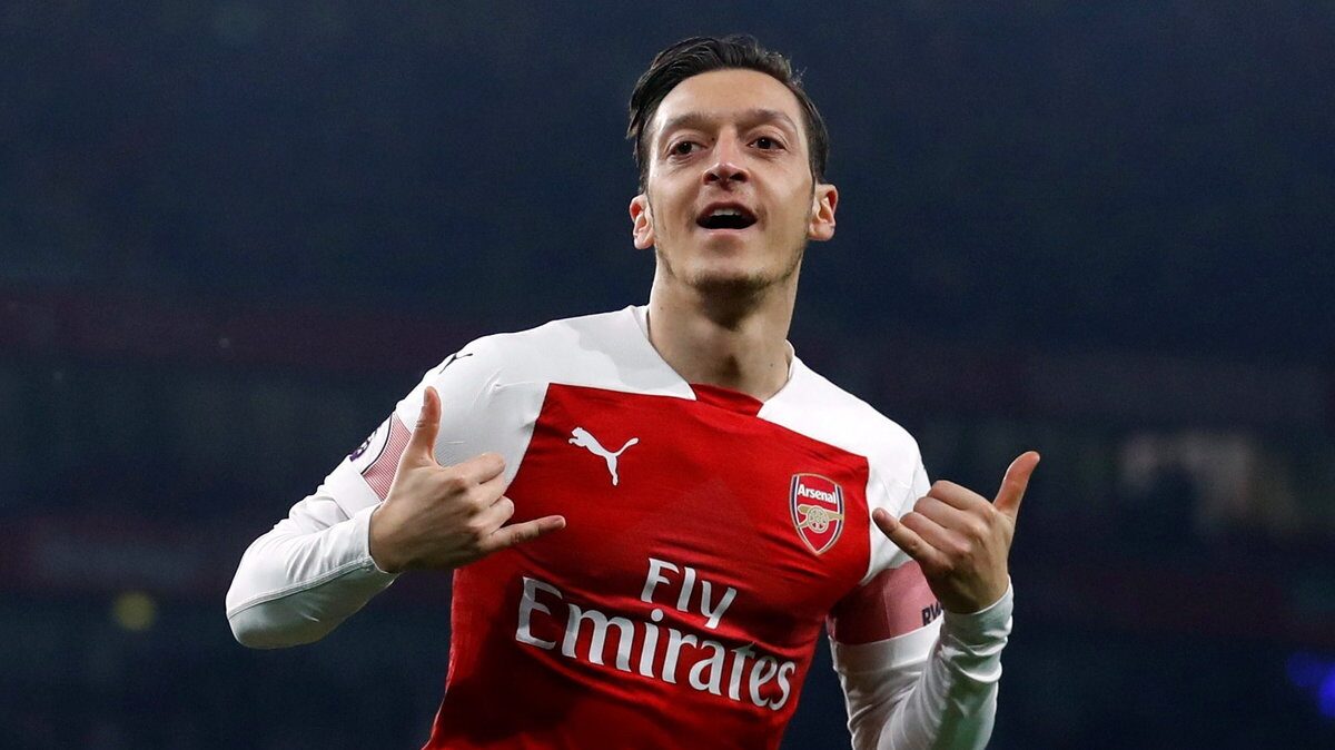 Mesut Ozil doing hand gestures